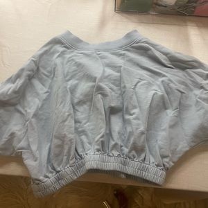 Sugar Lips “Deanna Dolman Puff Sleeve French Terry Knit Crop Top”- Baby Blue